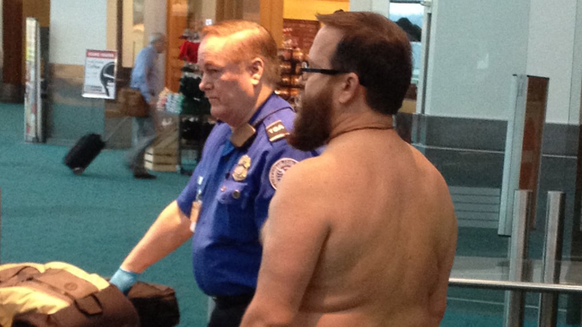 articles/2012/05/09/man-s-airport-strip-meant-to-highlight-intrusive-and-ineffective-tsa-security/tsa-nudist-protest-ross_hgxsr6