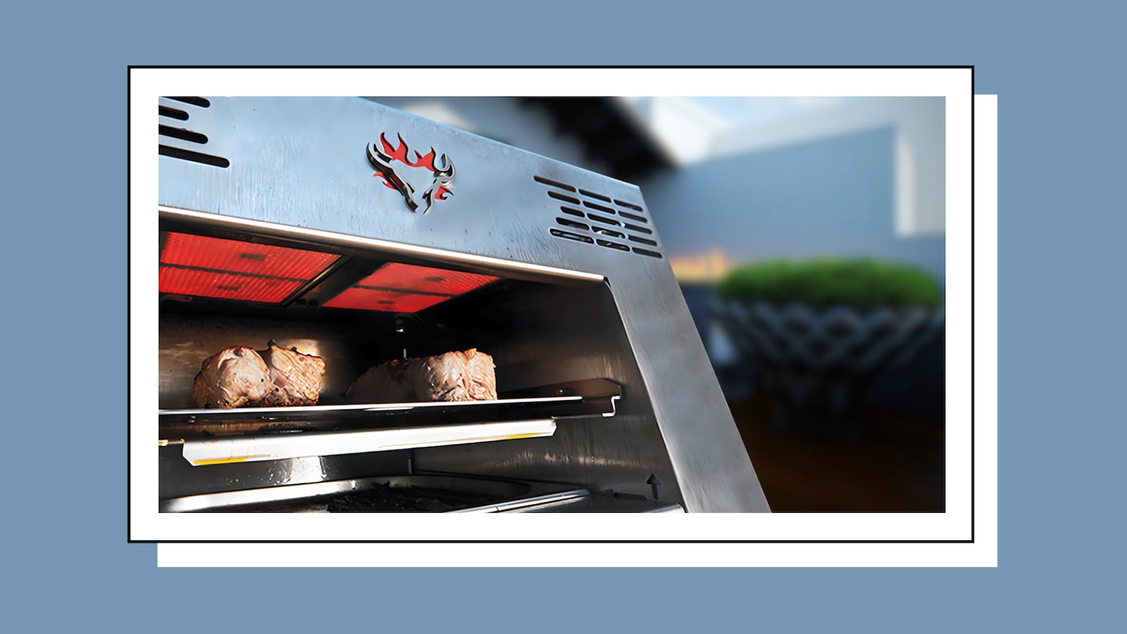 Schwank Grills' Portable Infrared Grill, cooking steaks in an outdoor setting