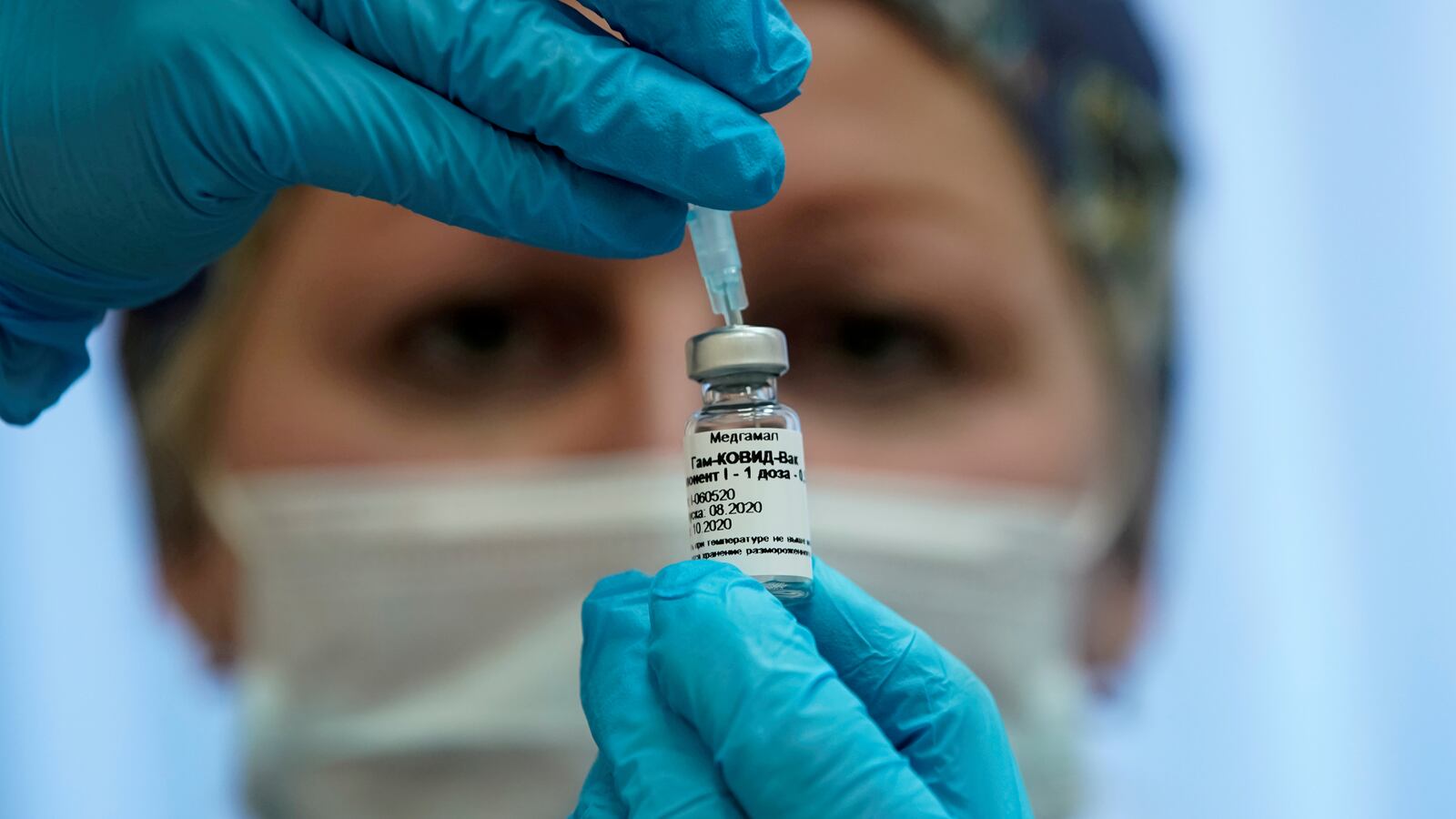 2020-10-11T230230Z_1524972605_RC2NGJ93EU4T_RTRMADP_3_HEALTH-CORONAVIRUS-TRIAL-INSURANCE_s3ybxu