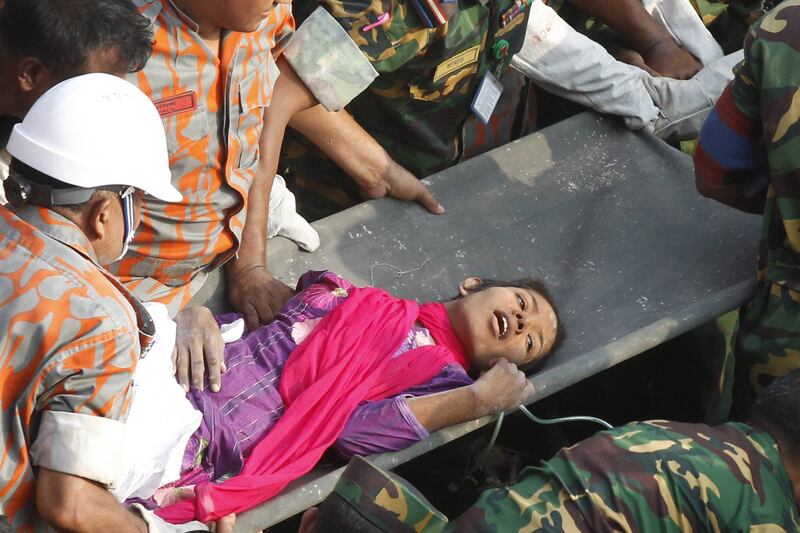 galleries/2013/05/10/woman-rescued-from-rubble-17-days-after-bangladesh-factory-collapse-photos/garment-rescue-1_sgxvtp