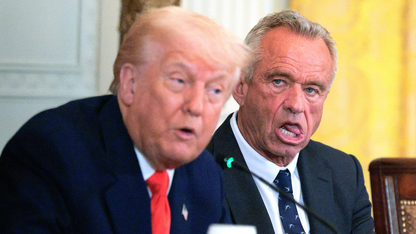 U.S. President Donald Trump and Health and Human Services Secretary Robert F. Kennedy Jr. attend an event introducing a new Make America Healthy Again