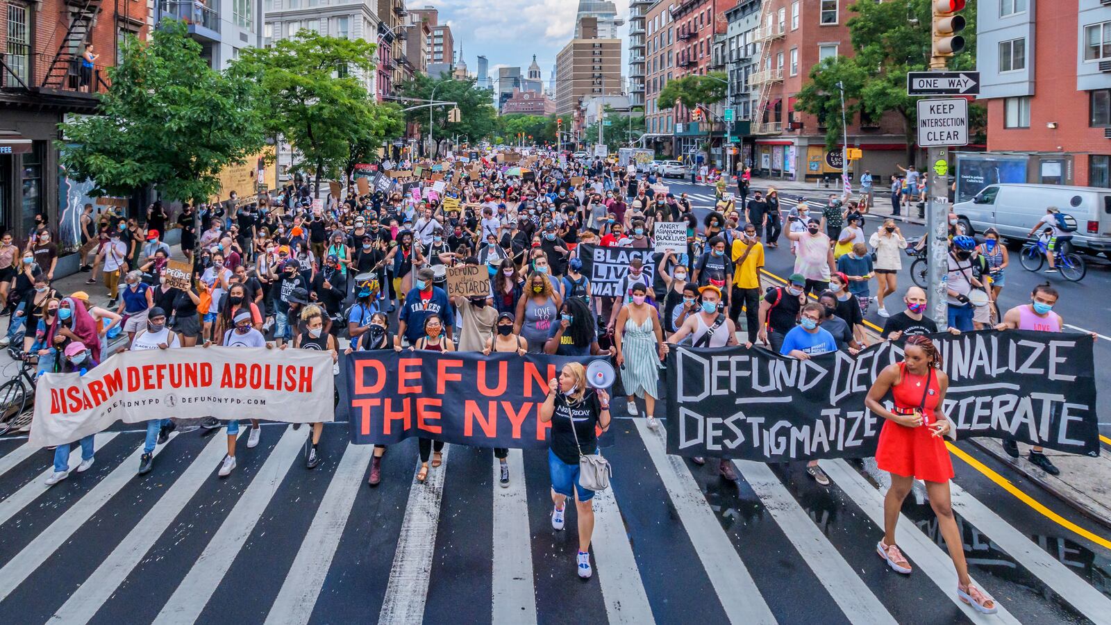 A photograph of protestors on the evening before the NYC budget decision to support defunding the police force.