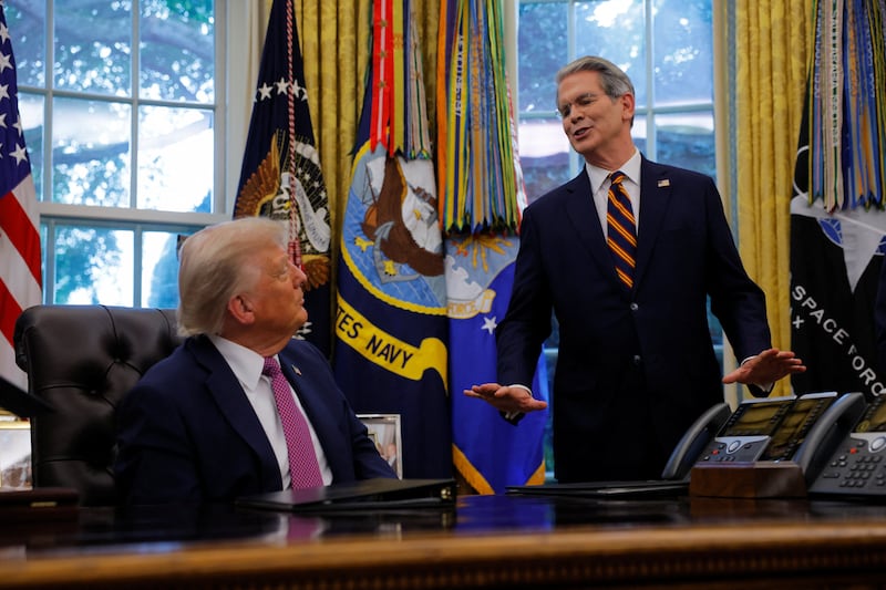 President Donald Trump asks U.S. Secretary of the Treasury Scott Bessent if he wants to be Fed Chair, at the White House in Washington, D.C., U.S., September 5, 2025.