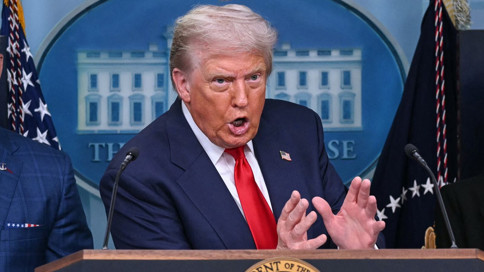 President Donald Trump, pictured Aug. 11, threatened Federal Reserve Chair Jerome Powell with a "lawsuit" over the cost of the Fed renovations the same day the latest CPI showed core inflation ticking up.