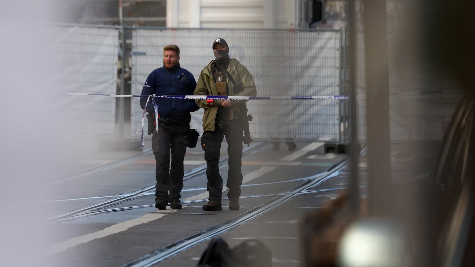 Police officers work after a police operation against a deadly shooting suspect, in Schaerbeek, Brussels, Belgium, Oct. 17, 2023.