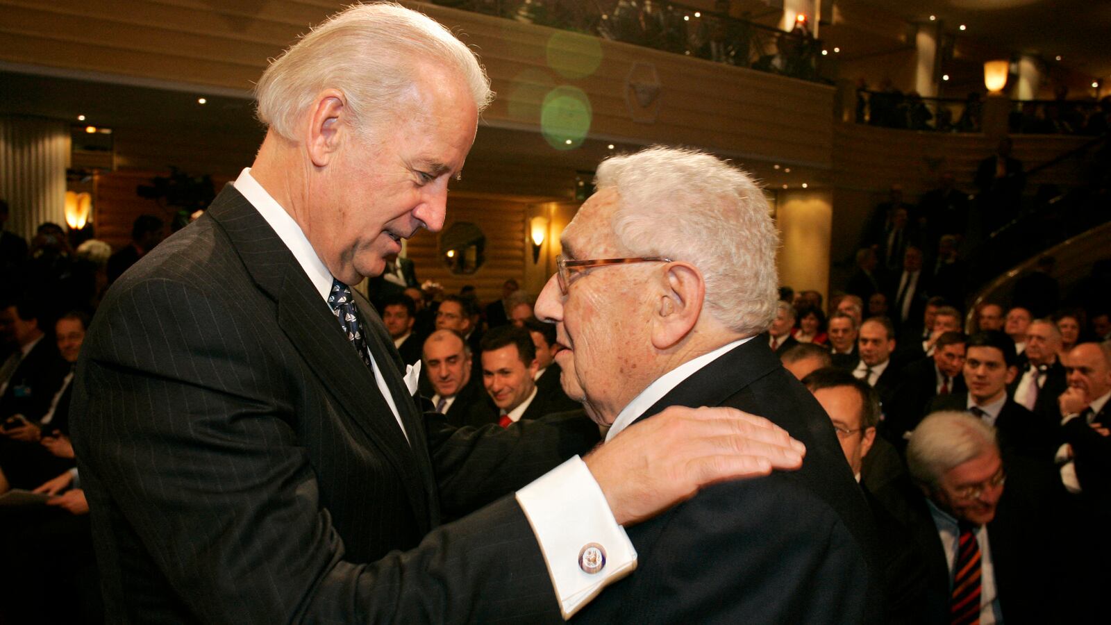Joe Biden (L) talks with former US Foreign Minister Henry Kissinger on the second day of the 45th Munich Security Conference at the Bayerischer Hof Hotel, southern Germany, on February 7, 2009.