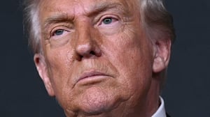US President Donald Trump arrives for the 48th Kennedy Center Honors gala at the Kennedy Center in Washington, DC, on December 7, 2025. (Photo by Brendan SMIALOWSKI / AFP via Getty Images)