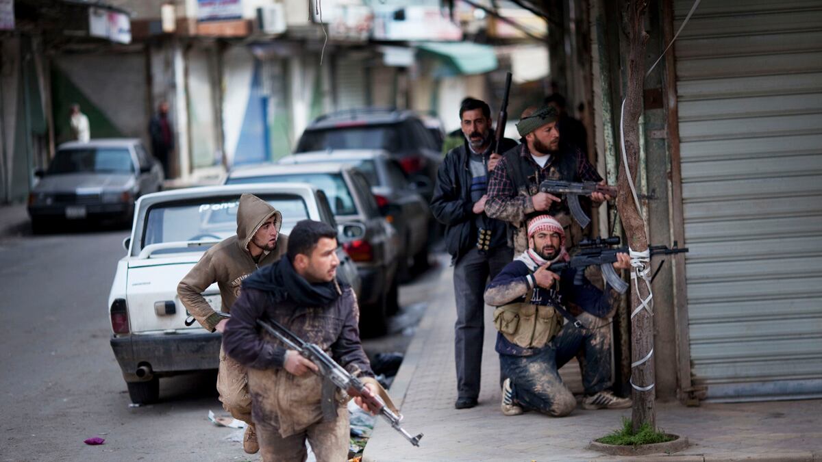 articles/2012/03/13/syrian-rebels-regime-offer-dueling-tales-of-karm-al-zeitoun-massacre/syria-shelling-paul_do1nzj