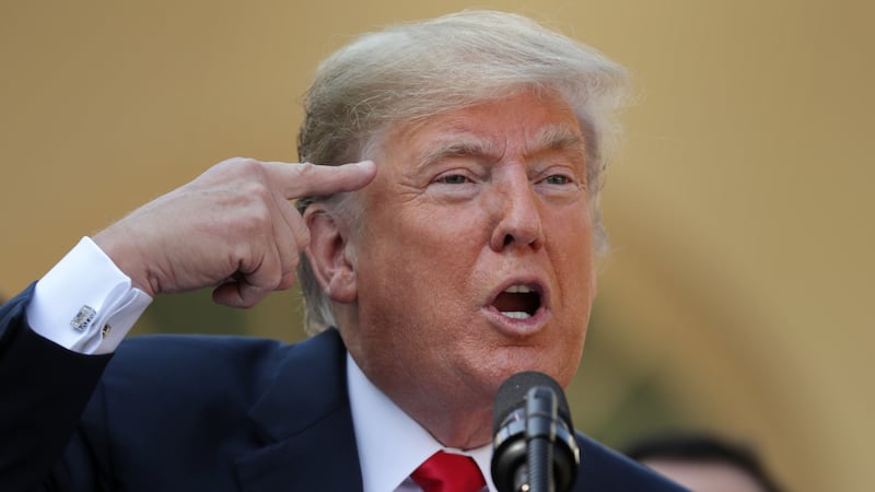 WASHINGTON, DC - OCTOBER 01: U.S. President Donald Trump calls journalists 'loco,' which is Spanish for crazy, during a press conference to discuss a revised U.S. trade agreement with Mexico and Canada in the Rose Garden of the White House on October 1, 2018 in Washington, DC. U.S. and Canadian officials announced late Sunday night that a new deal, named the 'U.S.-Mexico-Canada Agreement,' or USMCA, had been reached to replace the 24-year-old North American Free Trade Agreement.  (Photo by Chip Somodevilla/Getty Images)