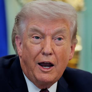U.S. President Donald Trump speaks during the signing ceremony for an execituve order on mail ballots, in the Oval Office of the White House in Washington, D.C., March 31, 2026.  REUTERS/Evan Vucci