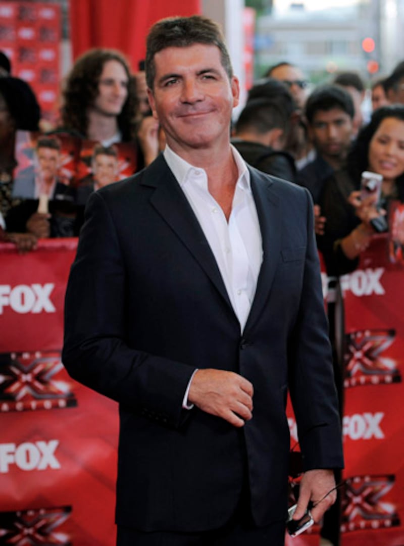 galleries/2012/08/10/jeremy-renner-in-bourne-legacy-steve-carrell-more-hot-after-40-stars-photos/cowell-famous-after-forty_pw7ise