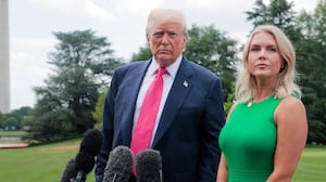 President Donald Trump, joined by White House Press Secretary Karoline Leavitt, speaks to the media as he departs the White House on July 15, 2025 in Washington, DC.