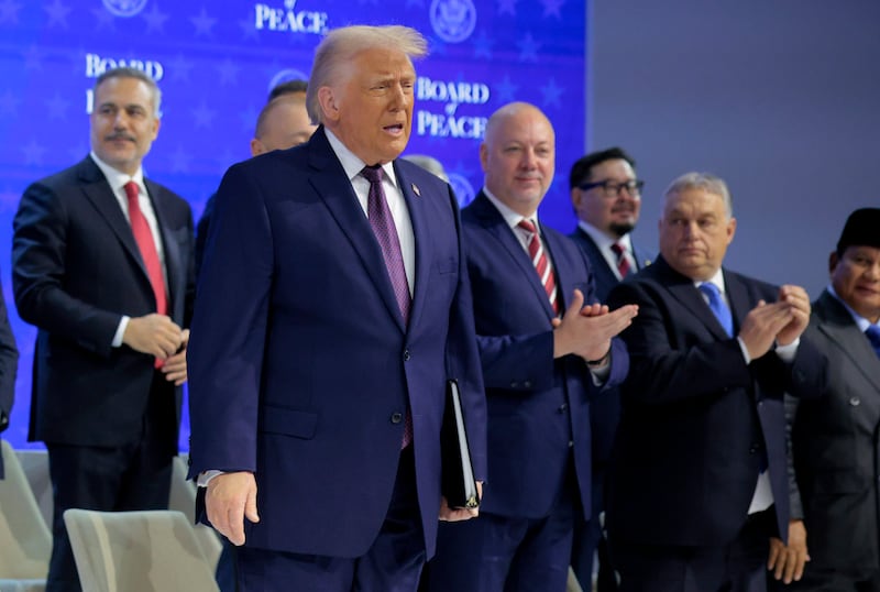 DAVOS, SWITZERLAND - JANUARY 22: U.S. President Donald Trump presents the “Board of Peace” onstage at the World Economic Forum (WEF) on January 22, 2026 in Davos, Switzerland. The annual meeting of political and business leaders comes amid rising tensions between the United States and Europe over a range of issues, including Trump's vow to acquire Greenland, a semi-autonomous Danish territory. (Photo by Chip Somodevilla/Getty Images)