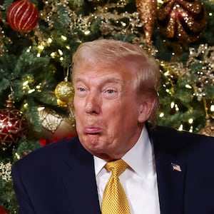 PALM BEACH, FLORIDA - DECEMBER 24: U.S. President Donald Trump calls children as he participates in tracking Santa Claus' movements with the North American Aerospace Defense Command (NORAD) Santa Tracker on Christmas Eve at the Mar-a-Lago resort on December 24, 2025 in Palm Beach, Florida. This is the 70th year that NORAD has publicly tracked Santa’s sleigh on its global rounds. (Photo by Tasos Katopodis/Getty Images)