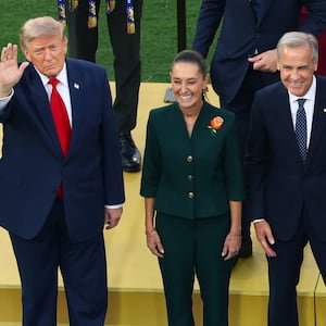 Soccer Football - FIFA World Cup 2026 - Final - Spain v Argentina - New York/New Jersey Stadium, East Rutherford, New Jersey, U.S. - July 19, 2026 FIFA President Gianni Infantino, Canada's Prime Minister Mark Carney, Mexico President Claudia Sheinbaum and U.S. President Donald Trump on the podium ahead of the trophy ceremony after Spain wins the World Cup REUTERS/Mike Segar