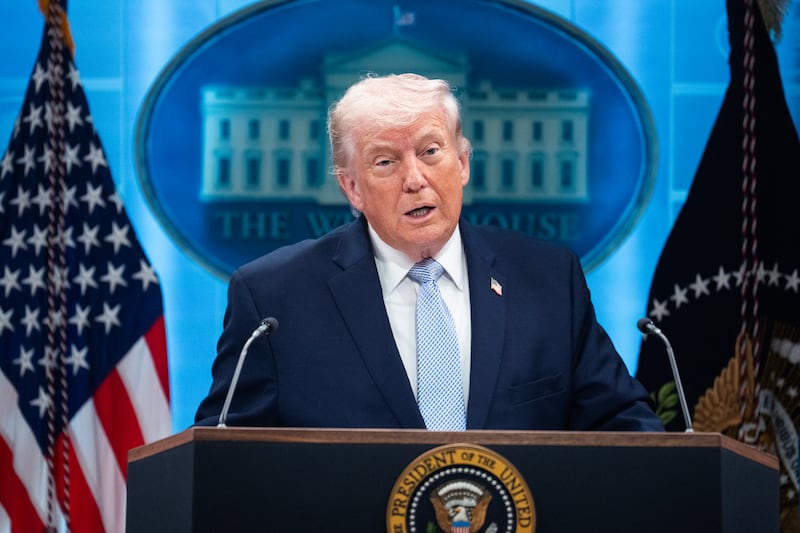President Donald Trump, pictured April 6, is touting victory in the Iran war, but the country is already planning to charge tankers going through the Strait of Hormuz.