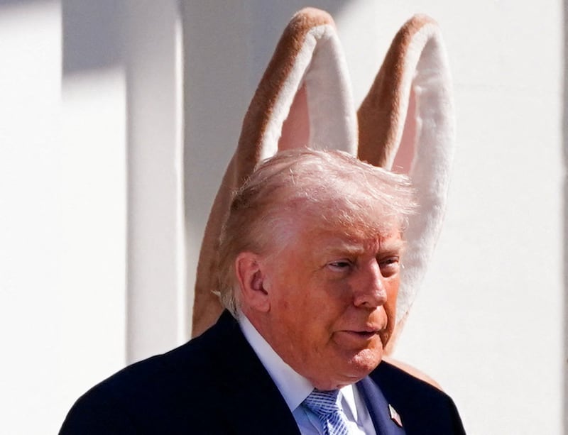 President Donald Trump, standing next to the Easter Bunny, attends the 2026 White House Easter Egg Roll at the White House in Washington, D.C., U.S., April 6, 2026.