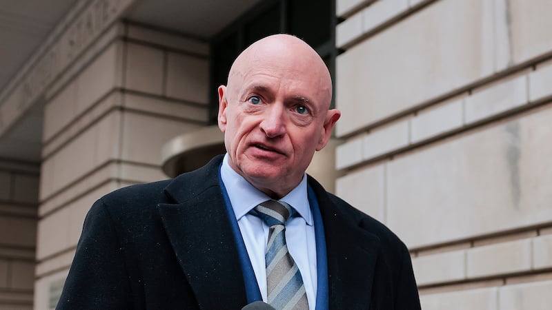 WASHINGTON, DC - FEBRUARY 03: Sen. Mark Kelly (D-AZ) speaks after departing federal court on February 03, 2026 in Washington, DC. Kelly is suing U.S. Secretary of War Pete Hegseth, asking a federal court to vacate the Pentagon chief's letter censuring the Arizona Democrat and moving to lower his military retirement rank. (Photo by Heather Diehl/Getty Images)