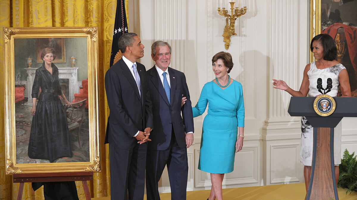 articles/2012/05/31/mark-mckinnon-at-the-george-w-bush-portrait-ceremony/bush-obama-portrait-hanging-mckinnon-tease_mtvasv