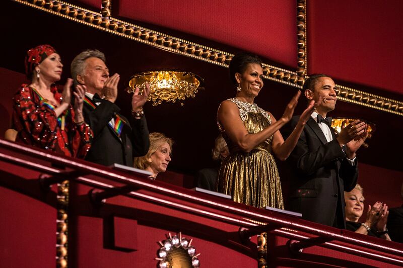 articles/2012/12/03/michelle-obama-goes-for-the-gold-karl-lagerfeld-s-new-collaboration/mobamagoldEDIT_za2fur