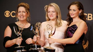 Ann Dowd (L) poses with the Emmy for Outstanding Supporting Actress in a Drama Series, Elisabeth Moss with the Emmy for Outstanding Lead Actress in a Drama Series and Alexis Bledel with the Emmy for Outstanding Guest Actress in a Drama, all awards for the The Handmaid's Tale
