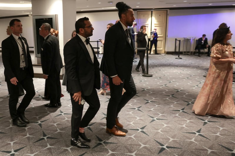 Federal Bureau of Investigation (FBI) Director Kash Patel walks following a shooting incident during the annual White House Correspondents’ Association dinner in Washington, D.C., U.S., April 25, 2026