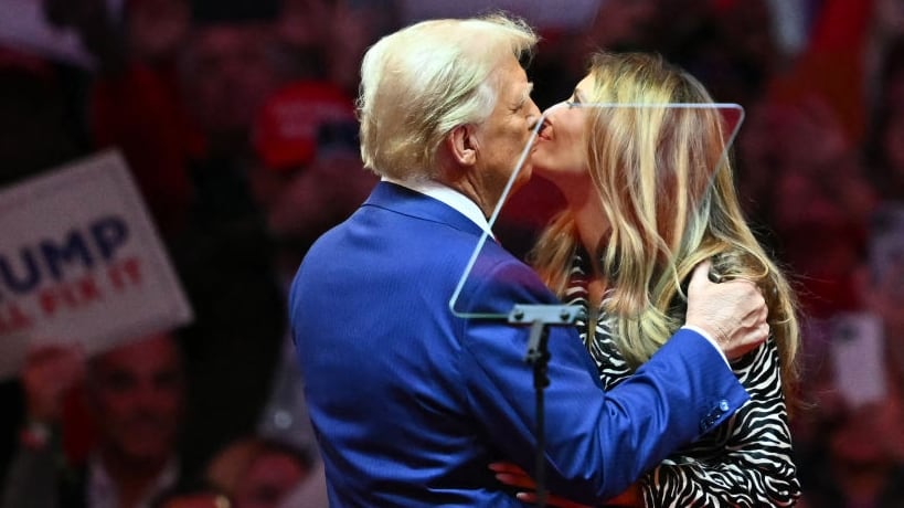 Donald Trump joins his wife Melania Trump on stage during a campaign rally at Madison Square Garden.
