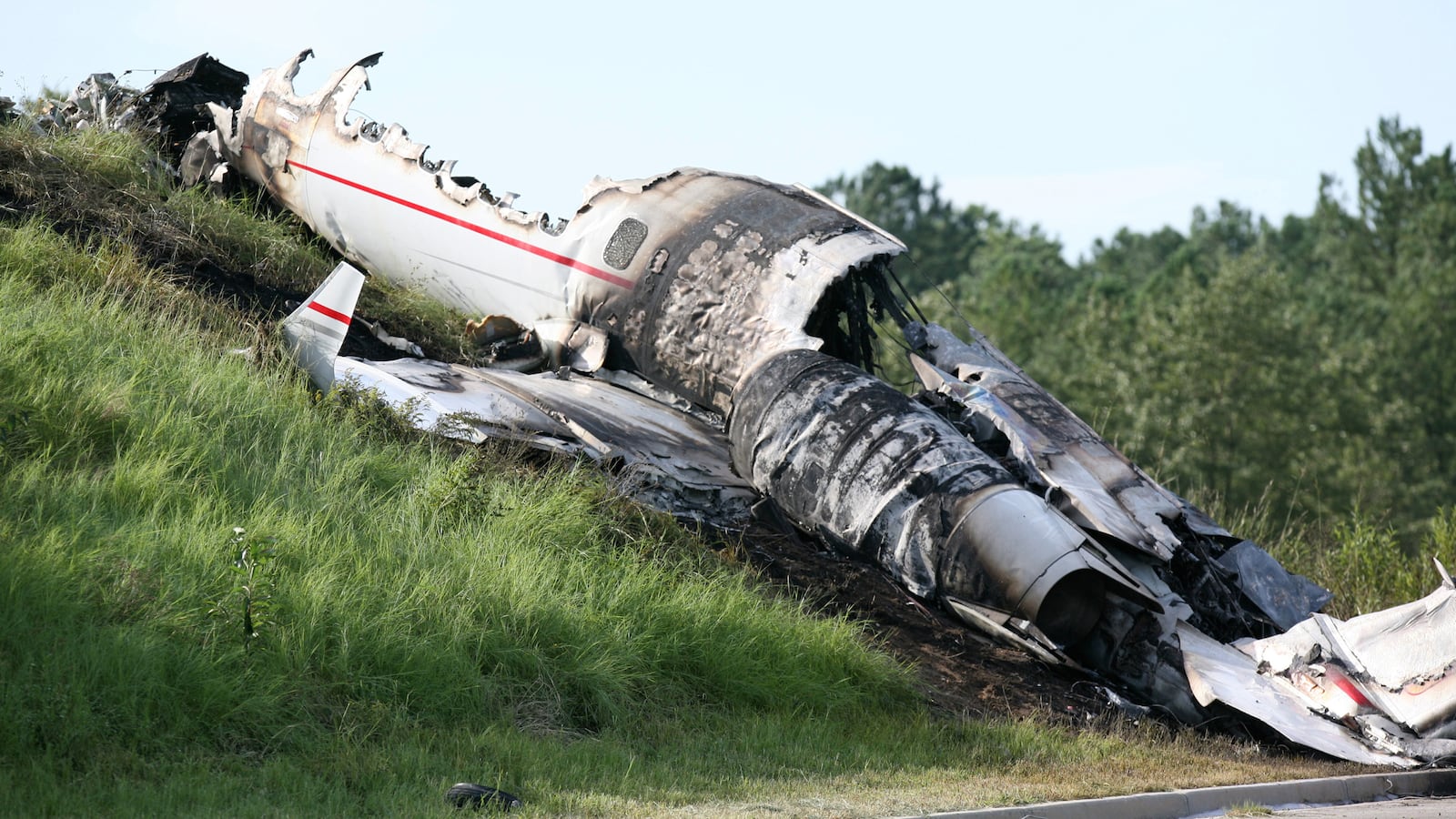 The Learjet 60 barreled through a South Carolina airport fence, crossed a highway and then exploded.