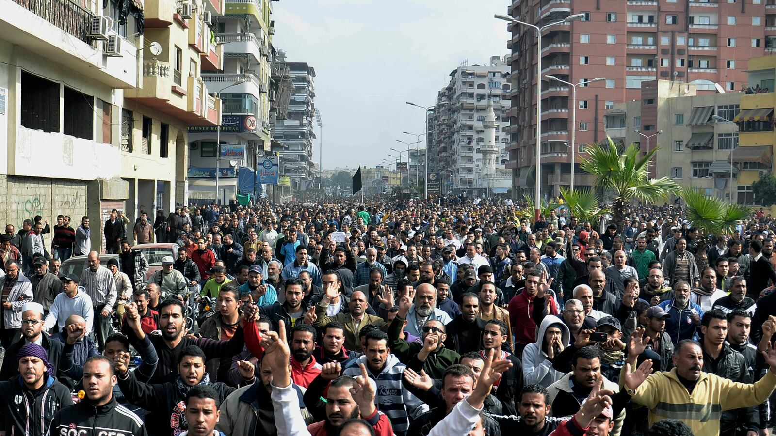 articles/2013/01/29/egyptians-defy-curfew-as-army-warns-of-collapse/130129-salama-giglio-port-said-tease-embed_cm55bp