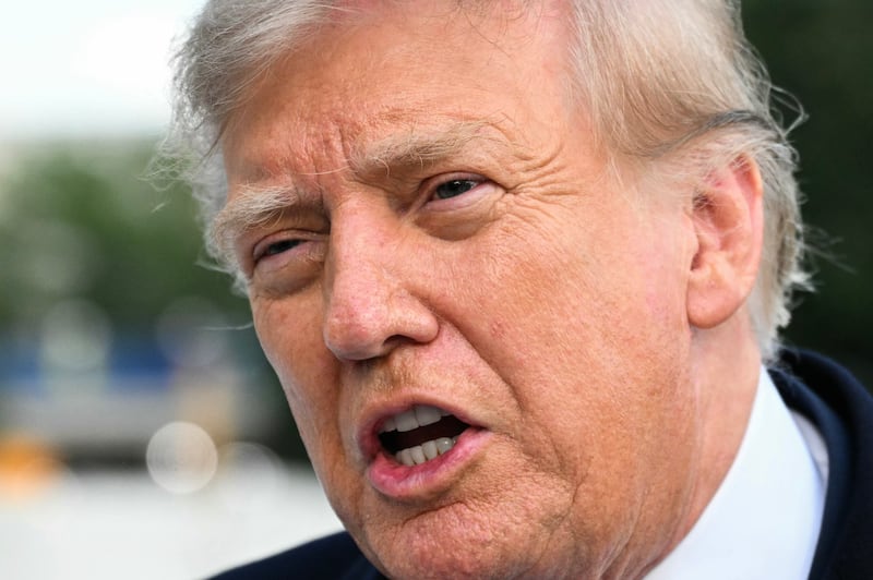 President Donald Trump speaks to the media after stepping off Marine One on the South Lawn of the White House in Washington, DC, on September 23, 2026.
