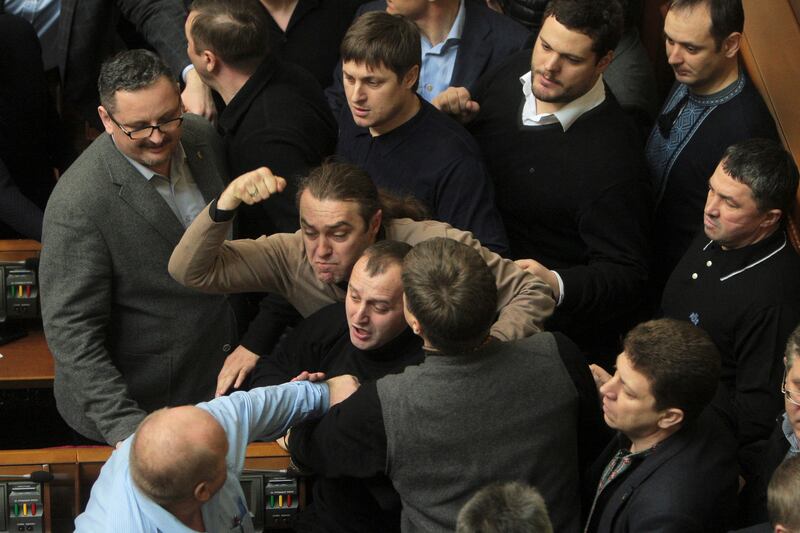 galleries/2014/07/28/from-ukraine-to-a-pillow-fight-the-craziest-bloodiest-political-brawls-photos/140724-pols-attack-2_zndzjq