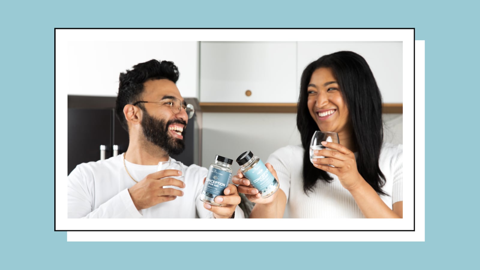 Smiling couple holding Eu Natural Conception for Her and Conception for Him fertility supplements, lifestyle image representing a shared fertility journey.