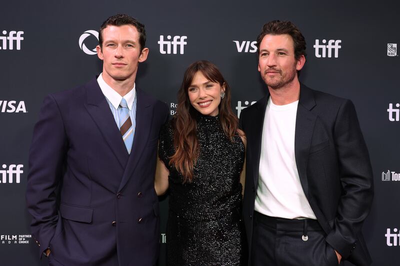 Callum Turner, Elizabeth Olsen, and Miles Teller attend the premiere of "Eternity" during the 2025 Toronto International Film Festival on September 07, 2025