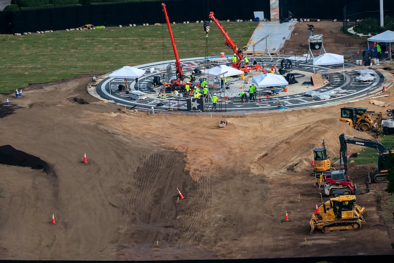 Construction crews are working to bring the South Lawn level with the helipad.