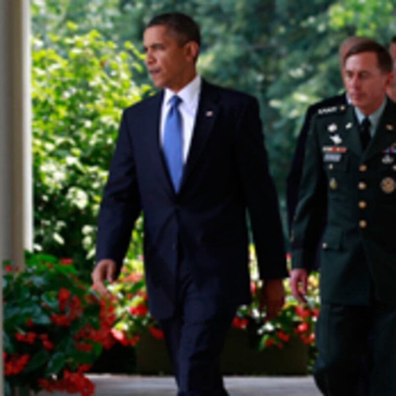 articles/2010/06/23/mcchrystal-fired-inside-the-obama-teams-meeting-afterward/grove-obama-mcchrystal_109291_oqk1o6