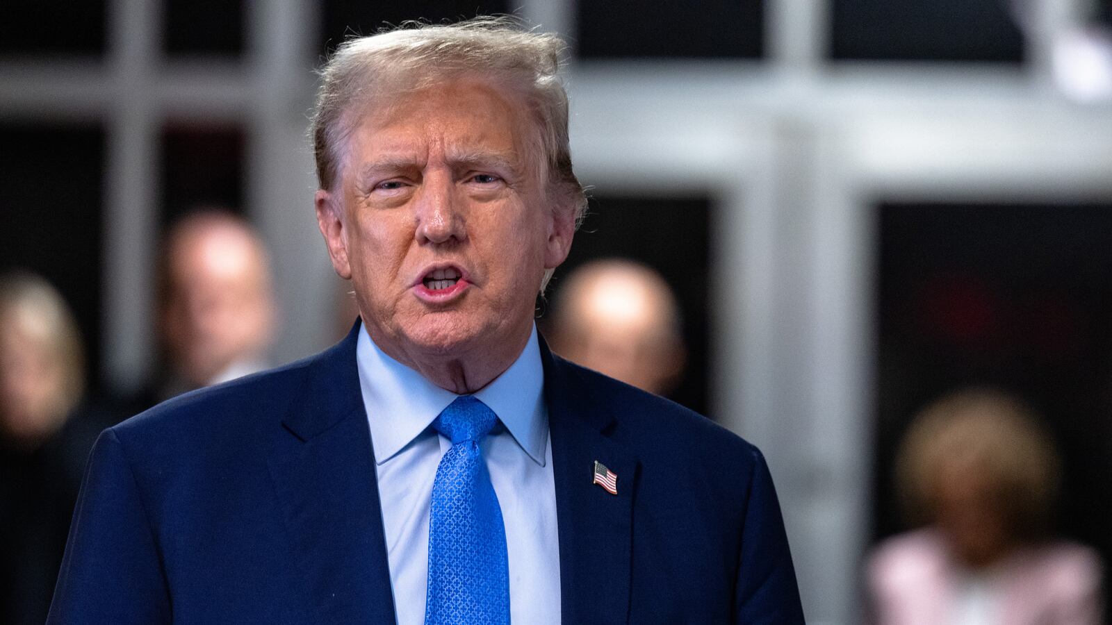 Former U.S. President Donald Trump speaks to members of the media during his hush money trial at Manhattan criminal court on April 26, 2024, in New York City.