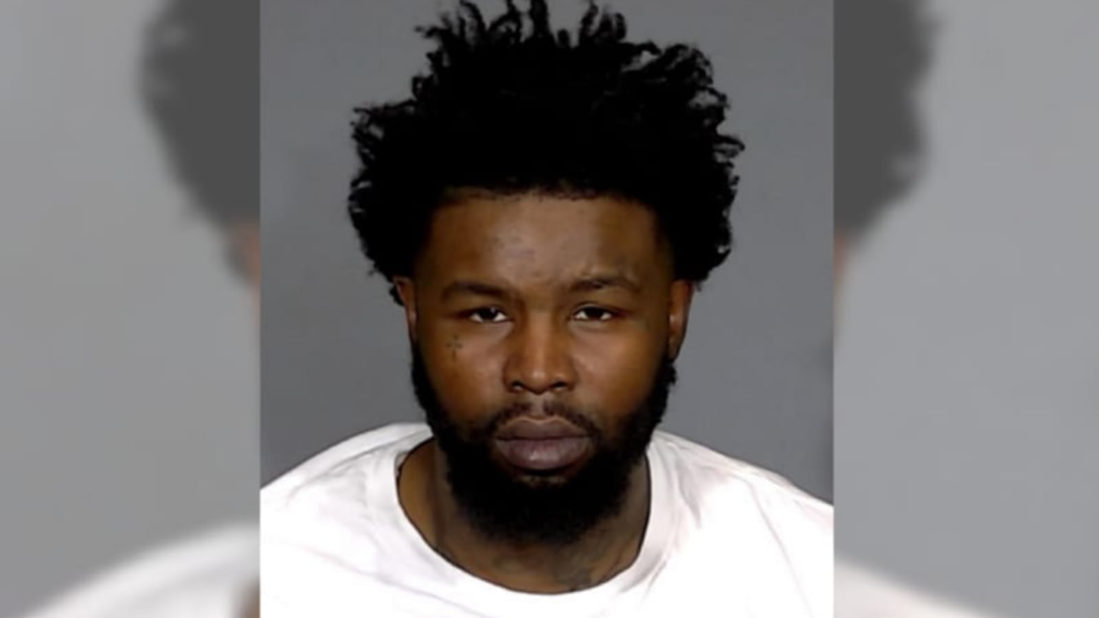 Kevin Mason stares forward in a mugshot.