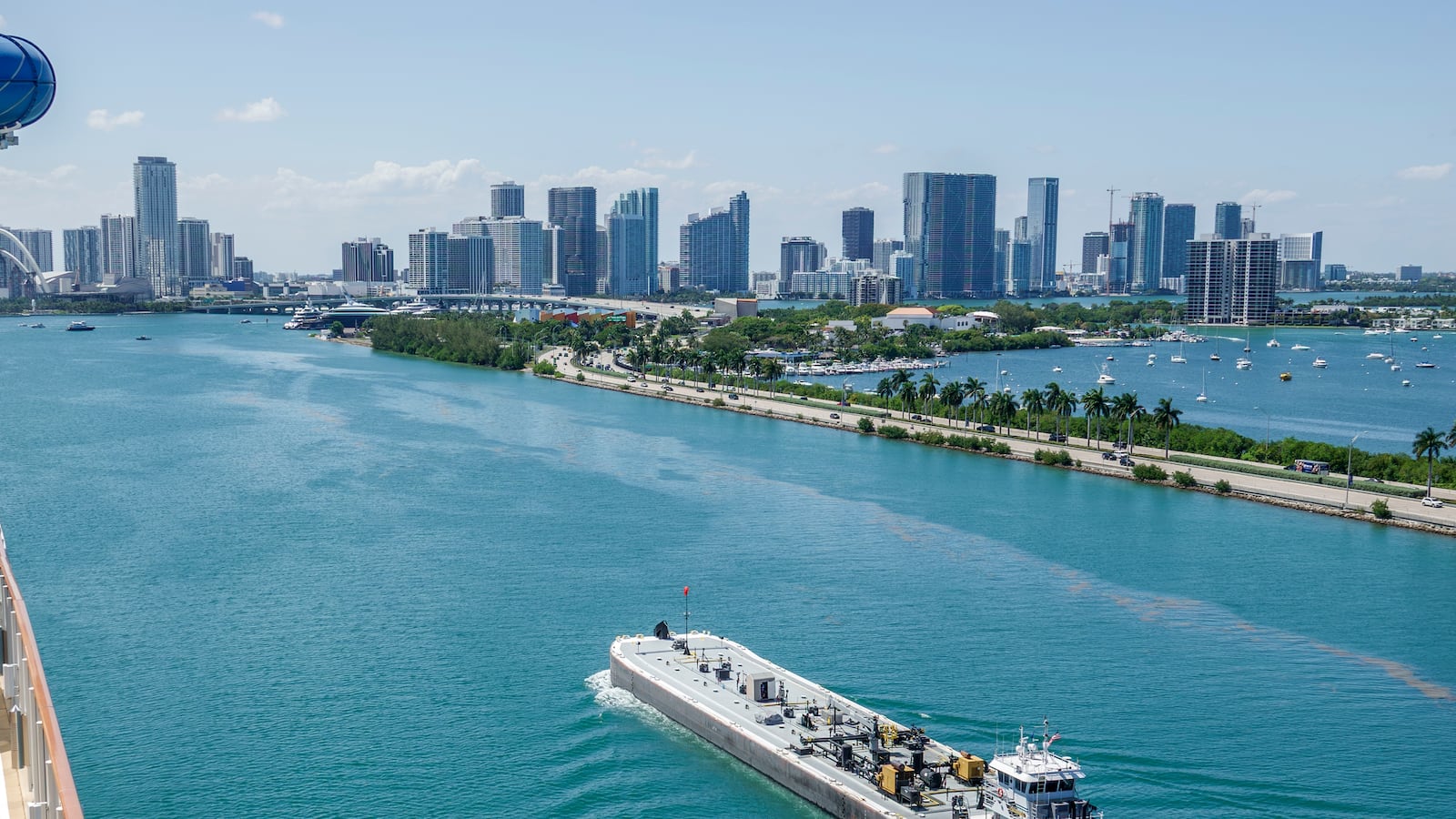 Miami, Florida, PortMiami, Port of Miami, terminal, Norwegian Cruise Line, Biscayne Bay, barge, tugboat, skyline. (Photo by: Jeffrey Greenberg/Universal Images Group via Getty Images)