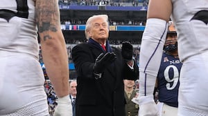 BALTIMORE, MARYLAND - DECEMBER 13: U.S. President Donald Trump participates in the coin toss before the start of the 126th Army-Navy Game between the Army Black Knights and the Navy Midshipmen at M&T Bank Stadium on December 13, 2025 in Baltimore, Maryland. The teams are competing for the Commander-in-Chief's Trophy, with President Trump attending the rivalry for the second consecutive year. (Photo by Tasos Katopodis/Getty Images)