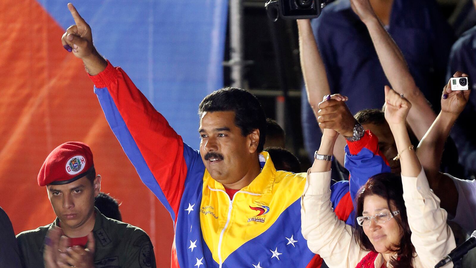 articles/2013/04/15/chavez-heir-nicolas-maduro-wins-by-razor-thin-margin/130415-venezuela-election-margolis-tease_gqsyus