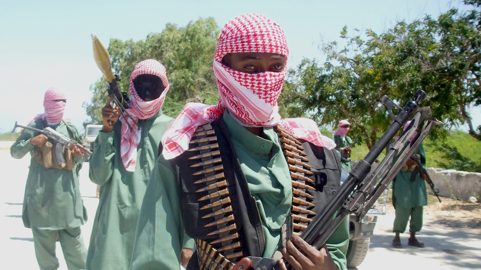 articles/2013/09/30/ahmed-abdi-godane-is-al-shabab-s-osama-bin-laden/130929-al-shabab-dettmer-tease_pmmybf