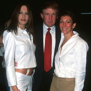 Melania Trump (then Melania Knauss) and Donald Trump, with British socialite Ghislaine Maxwell in 2000.
