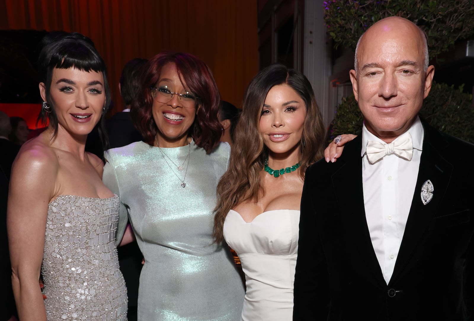 Katy Perry, Gayle King, Lauren Sánchez, and Jeff Bezos at the 2025 Vanity Fair Oscar Party.