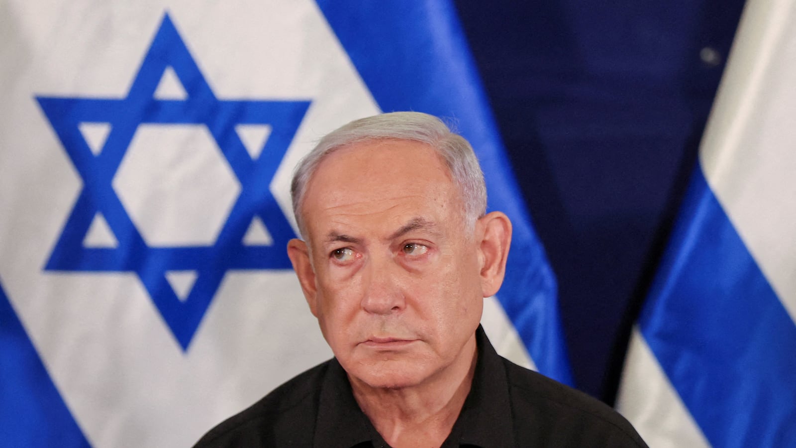 Benjamin Netanyahu during a press conference with defense minister Yoav Gallant and Cabinet minister Benny Gantz