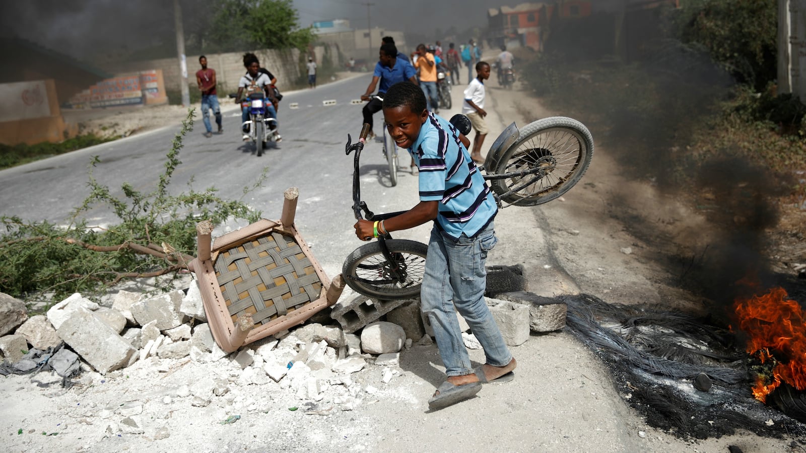 180708-haiti-violence-u.s.-warning-cheat_iklenl