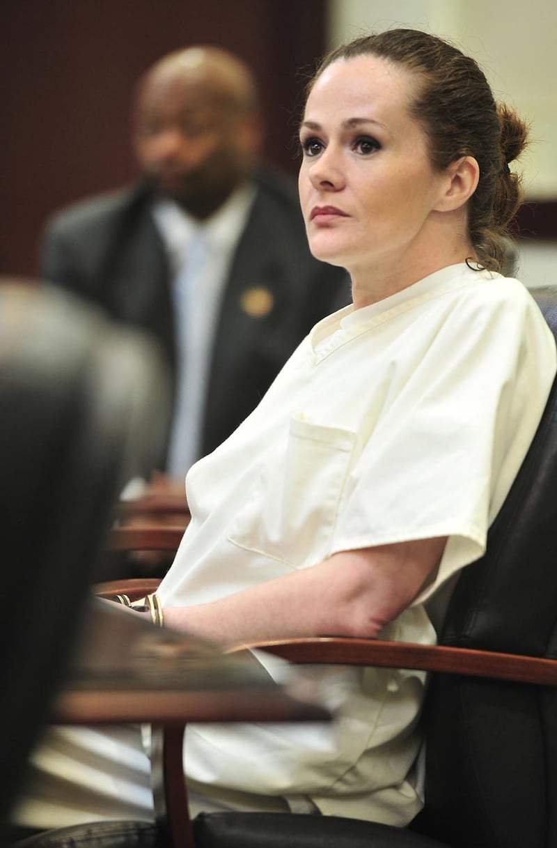 Christa Gail Pike, on death row for a slaying, appeared in court to fight a conviction in a 2001 attack on another inmate.