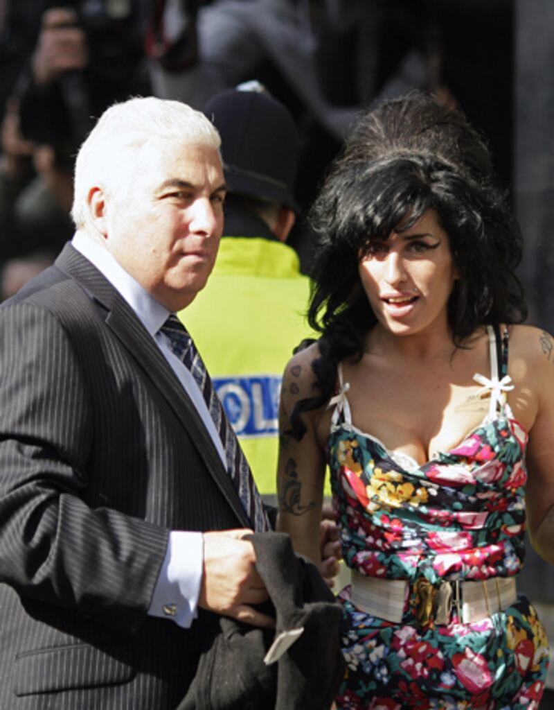 galleries/2012/04/25/deion-sanders-courtney-love-more-celeb-family-twitter-feuds-photos/twitter-family-feuds-amy-mitch-winehouse_pyiczi