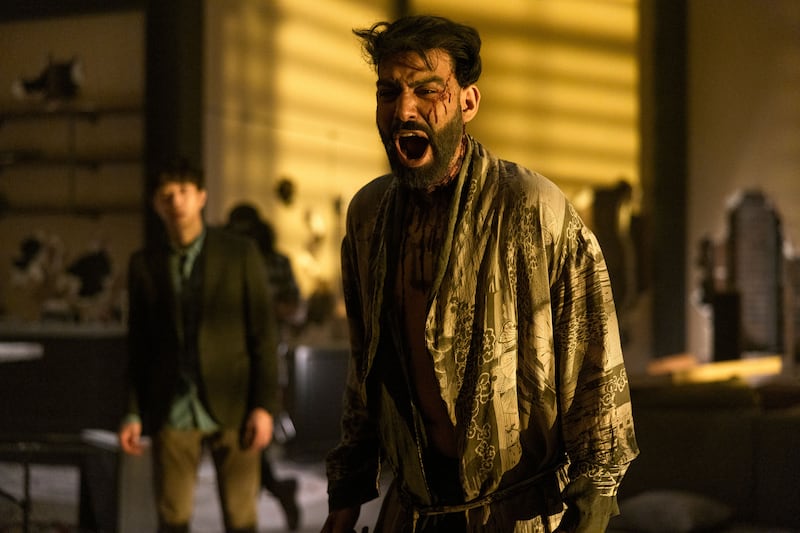 Rahul Kohli covered in blood and screaming in a still from ‘The Fall of the House of Usher’