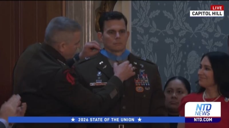 Slover receiving his Medal of Honor.