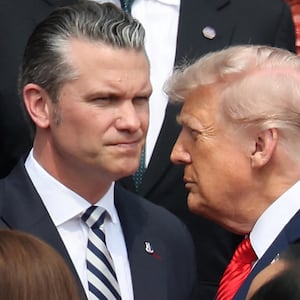 U.S. President Donald Trump and Defense Secretary Pete Hegseth attend a welcome ceremony at the Great Hall of the People in Beijing, China May 14, 2026. REUTERS/Maxim Shemetov/Pool